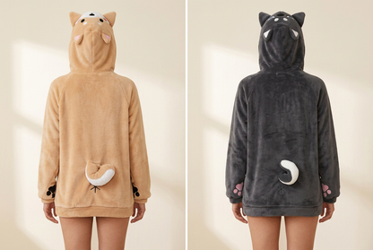 AI-generated rear view of a model wearing tan and charcoal animal hoodies, showing hoods and tails